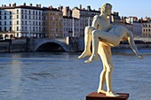 France, Rhone, Lyon, 5th district, Old Lyon district, historic site listed as World Heritage by UNESCO, sculpture in front of the footbridge of the Palais de Justice, Pont Bonaparte on La Saône in the background