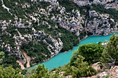 France, Var on the Left Bank and Alpes de Haute Provence on the Right Bank, Parc Naturel Regional du Verdon, kayaks and pedalos in the Verdon Gorge opening onto Lake St. Croix