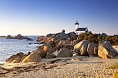 France, Finistere, Pagan country, Legend coast, Brignogan Plages, Beg Pol point, Pontusval lighthouse at sunset, listed as Historical monument