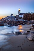 France, Finistere, Pays des Abers, Brignogan Plages, the Pontusval Lighthouse on the Pointe de Beg Pol at sunset