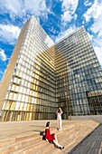 France, Paris, Tolbiac Nord district, the Bibliotheque Nationale de France (BNF) by architect Dominique Perrault, photo shooting in front of one of the tower of the BNF