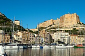 France, Corse du Sud, Bonifacio, the marina dominated by the bastion of the citadel banner