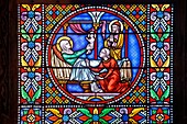 France, Puy de Dome, Issoire, roman church of Saint Austremoine, detail of stained glass, the birth of Mary