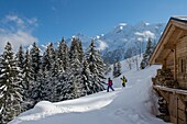 France, Haute Savoie, Massif of the Mont Blanc, the Contamines Montjoie, trails round in rackets with snow from the tracks of the Stage towards the chalet of Joux