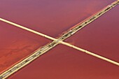 France, Bouches du Rhone, Camargue Regional Nature Park, Arles, Salin de Giraud, salt marshes (aerial view)