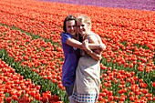 Girls in flower field