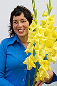 Woman holding Gladiolus