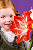 Girl holding Hippeastrum