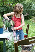 Girl planting lavender