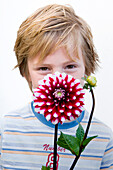 Boy holding Dahlia Karma Yin Yang