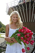 Woman holding tulips