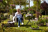 Woman enjoying the garden