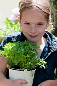 Girl holding rue