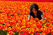Woman in tulip field