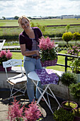 Woman standing on balcony