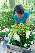 Woman looking at spring container