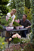 Woman decorating garden table