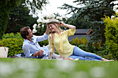 Couple relaxing in garden