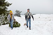 Couple with christmas tree