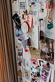 Pinboard with photos, notes and handmade decorations