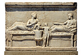 Votive relief depicting a symposium.