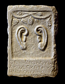 Votive relief dedicated to Dionysus.