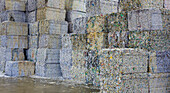 Bundles of waste paper at a recycling plant