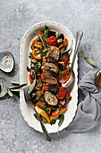 Roasted chicken thighs with grilled vegetables
