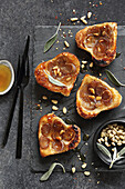 Mini tarte tatin with caramelised shallots, sage and pine nuts