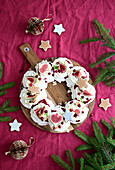 Meringue wreath with cranberry confit and macaroon cream