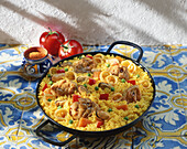 Paella with chicken and seafood