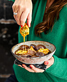 Onion soup with cheddar bites and garlic