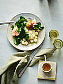Watercress salad with figs, kohlrabi cubes and vanilla oil