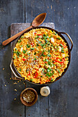 Vegan pearl barley paella with beans