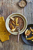 Warm buckwheat and cocoa porridge with caramelised pears