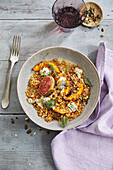 Wheat risotto with pumpkin, figs and blue cheese
