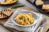 Smooth scrambled eggs and crunchy toasts