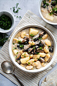 Vegan butter bean and potato stew with mushrooms