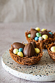 Easter nests made from vermicelli pasta and melted chocolate