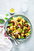 Pasta with roasted spinach polpette and tomatoes