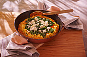 Rice omelette with spinach and feta