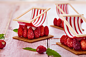 'Deckchairs' made from biscuits, wild strawberries and fondant