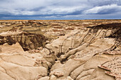 Bizarre landscape of eroded clay hills in the badlands of the San Juan Basin in New Mexico.