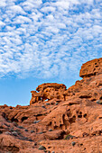 Unnamed natural arches in the eroded Aztec sandstone of Valley of Fire State Park in Nevada.