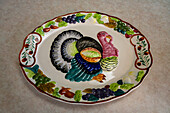 A vintage ceramic Thanksgiving turkey serving platter.