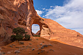 The Ear of the Wind, a natural sandstone arch in the Monument Navajo Valley Tribal Park, Arizona.