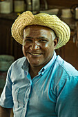 A Dominican woman on a cacao plantation tour. Dominican Republic.