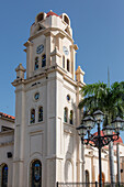 The bell tower of the Catholic Cathedral of Bani, Our Lady of Regla church, in Bani, Dominican Republic.