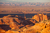 Telephoto view of the Totem Pole in Monument Valley from Hunt's Mesa in the Monument Valley Navajo Tribal Park in Arizona.