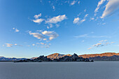 The Grandstand, a quartz monzonite island in the Racetrack Playa in Death Valley National Park in the Mojave Desert, California.